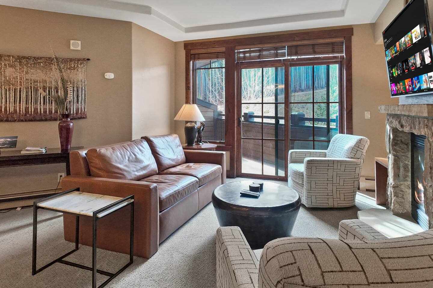 Peak 7 Slopeside Suite Ski In Ski Out Access with Resort Amenities and Hot Tubs