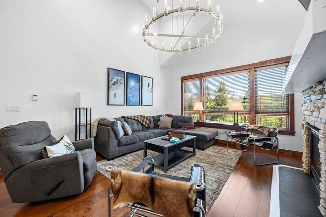 Bright living room with a mountain view